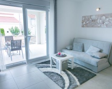 Living room and exit to the balcony - Apartment 1 (2+2)